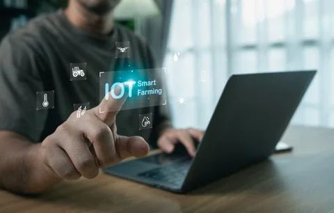 Man touching virtual IOT Smart Farming interface with digital agriculture i.. 写真素材