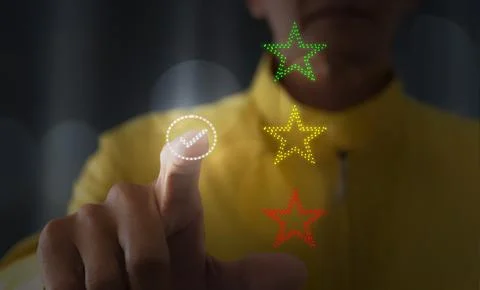 Man touching a virtual screen To rate satisfaction with business services f.. Photos
