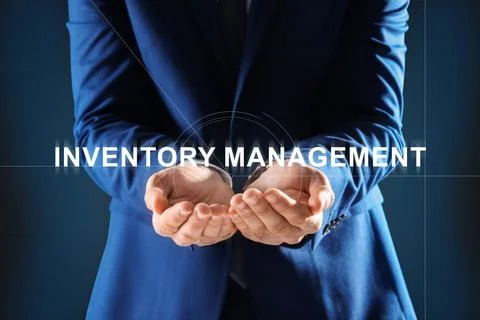 Man touching virtual screen with text Inventory Management on color backgroun Stock Photos