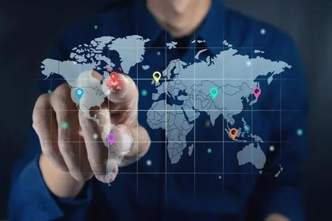 Man touching a virtual screen of world map infographic. World map infograph.. Stock Photos