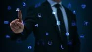 Man Touching A Visual Screen With Holographic Computer Icons. Blue. Stock Footage