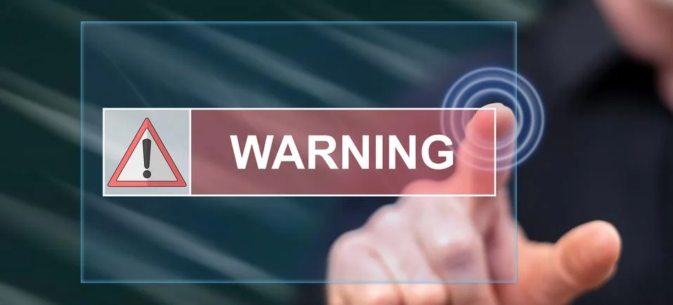 Man touching a warning concept Stock-Fotos
