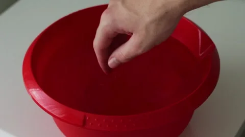 Man touching water in a basin Stock Footage 66755609