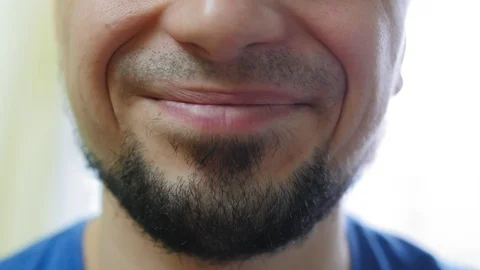 Man touchs his beard. Lower face facial hair. Stock Footage 127066008