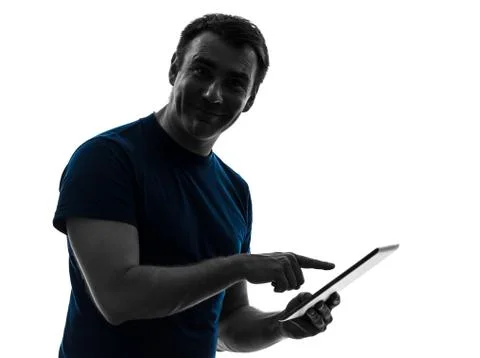 Man touchscreen digital tablet  posing portrait silhouette Stock Photos