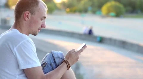 Man with a Touchscreen Phone Stock Footage 57257986