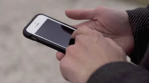Man with a Touchscreen Phone Stock-Footage 81169967
