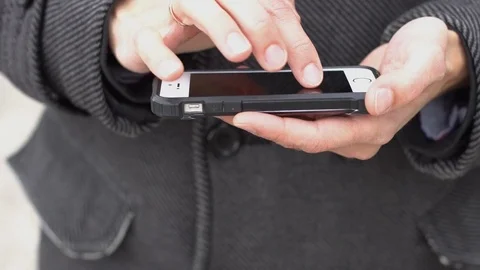 Man with a Touchscreen Phone Stock-Footage 81170060
