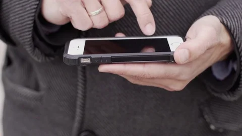 Man with a Touchscreen Phone Stock-Footage 81170078