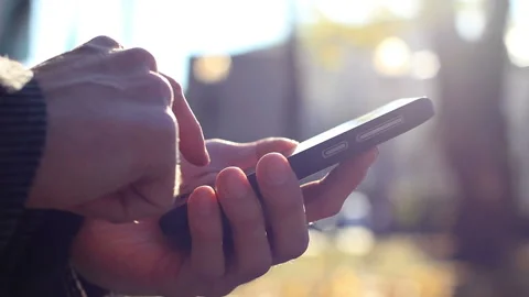 Man with a Touchscreen Phone Stock Footage 120291638