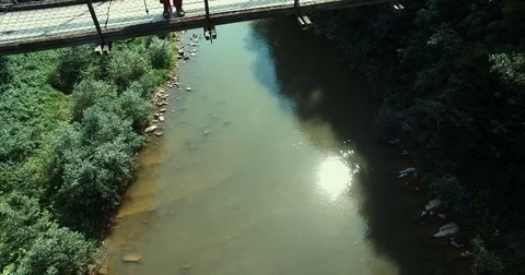 Man tourist standing on bridge. 스톡 동영상 78079356