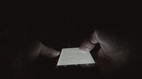 Man tourist using map application on smartphone in night city Video stock 105423434