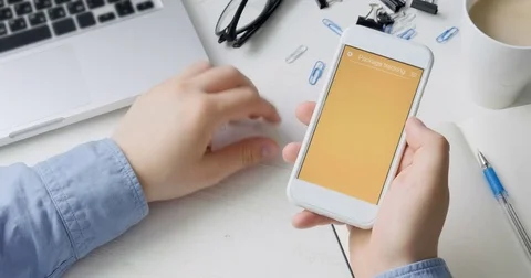 Man tracks his package using smartphone application Stock Footage 78501797