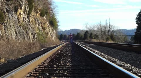 Man on train tracks Stock-Footage 10578261