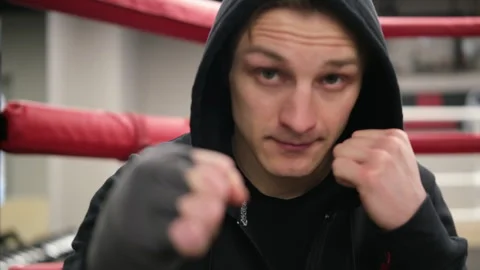 Man trainer on ring background for practice, coaching or sports training at gym Stock Footage 267391441