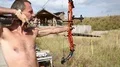 Man training at archery with bow and arrow HD Footage