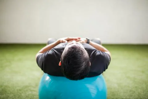 Man training on artificial grass Stock Photos
