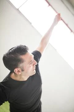 Man training on artificial grass Stock Photos