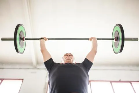 Man training on artificial grass Stock Photos