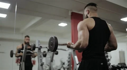 Man training barbell in the gym Stock Footage 56636702