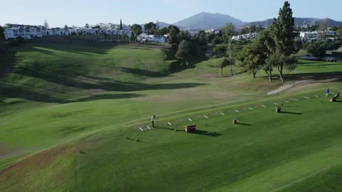 A man is training a game of golf view from above Stock Footage 232241308