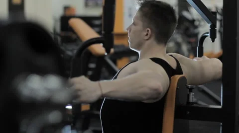 Man training in gym Stock Footage 62744704