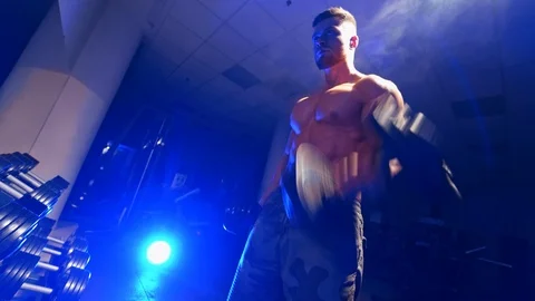 Man training in a gym Stock Footage 119263290