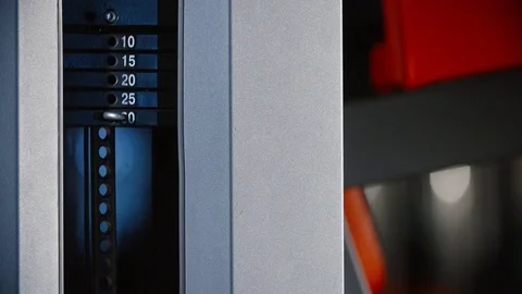 Man training his hands exercising weight rowing sport machine press workout gym Stock Footage 81903176