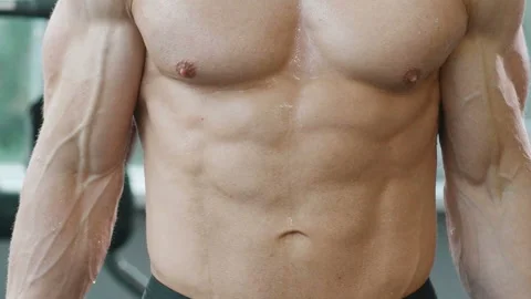 Man training pumping up biceps muscles Video stock 148354600