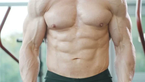 Man training pumping up biceps muscles Video stock 148354717