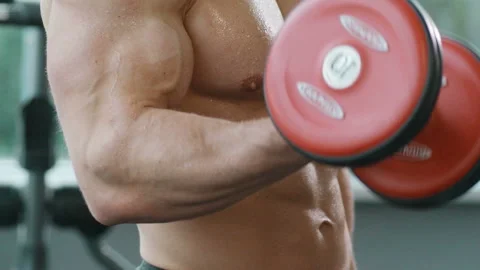 Man training pumping up biceps muscles Video stock 148354775
