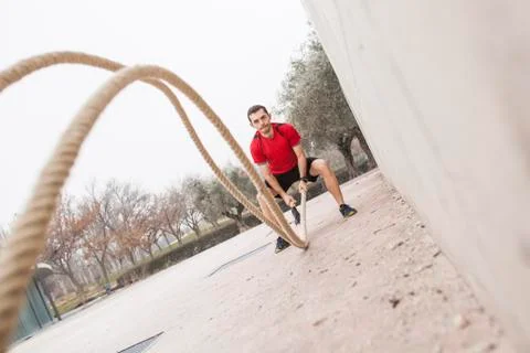 Man training with the rope 02 Stock Photos