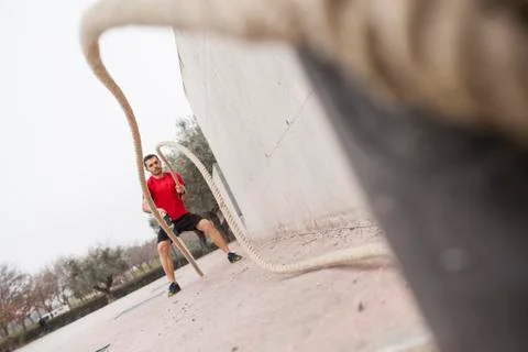 Man training with the rope 03 Stock Photos