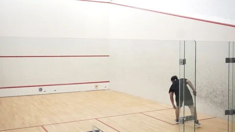 Man training in squash Stock Footage 121745171