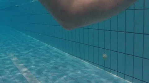 Man Training with Weight Underwater Stock Footage 121084813