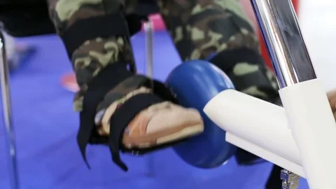 A man trains on a bicycle simulator Stock Footage 75702972