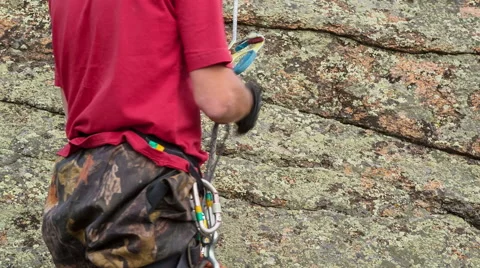 Man trains to conquer the rock Stock Footage 43203145