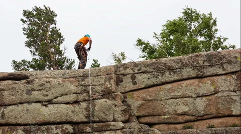 Man trains to conquer the rock Video stock 43738103