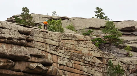 Man trains to conquer the rock Video stock 43738269
