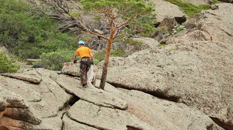Man Trains to Conquer the Rock Stock Footage 49450809