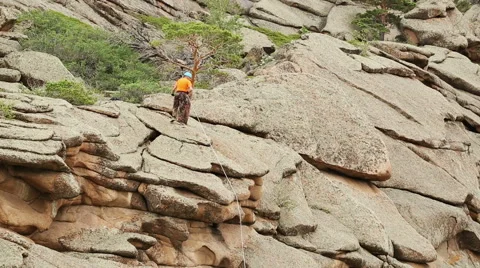 Man Trains to Conquer the Rock Stock Footage 49451058