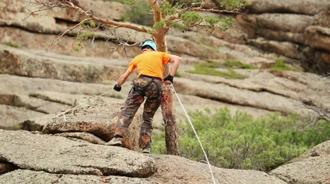 Man Trains to Conquer the Rock Stock Footage 49451195