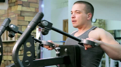 A man trains in a gym closeup Stock Footage 47245992