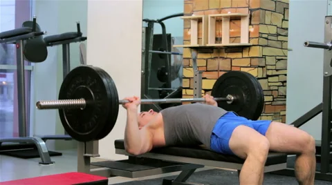 A man trains in a gym Stock Footage 47244508