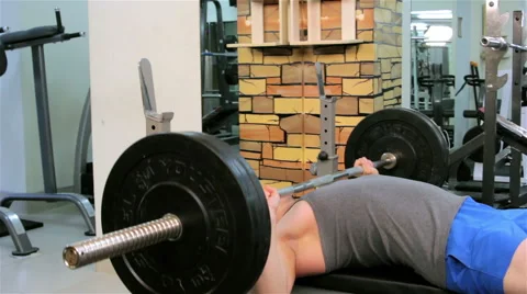 A man trains in a gym Stock Footage 47245019