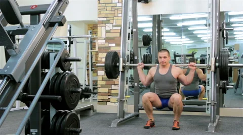 A man trains in a gym Stock Footage 47245285