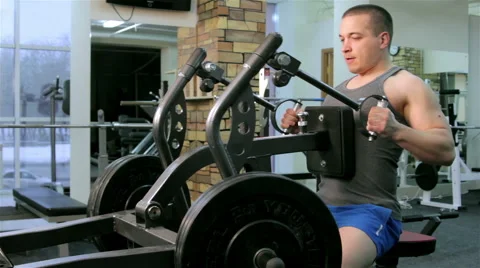 A man trains in a gym Stock Footage 47245686