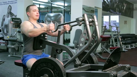 A man trains in a gym Stock Footage 47245855