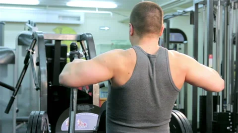 A man trains in a gym Stock Footage 47246148