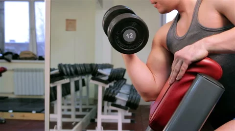 A man trains in a gym Stock Footage 47260691